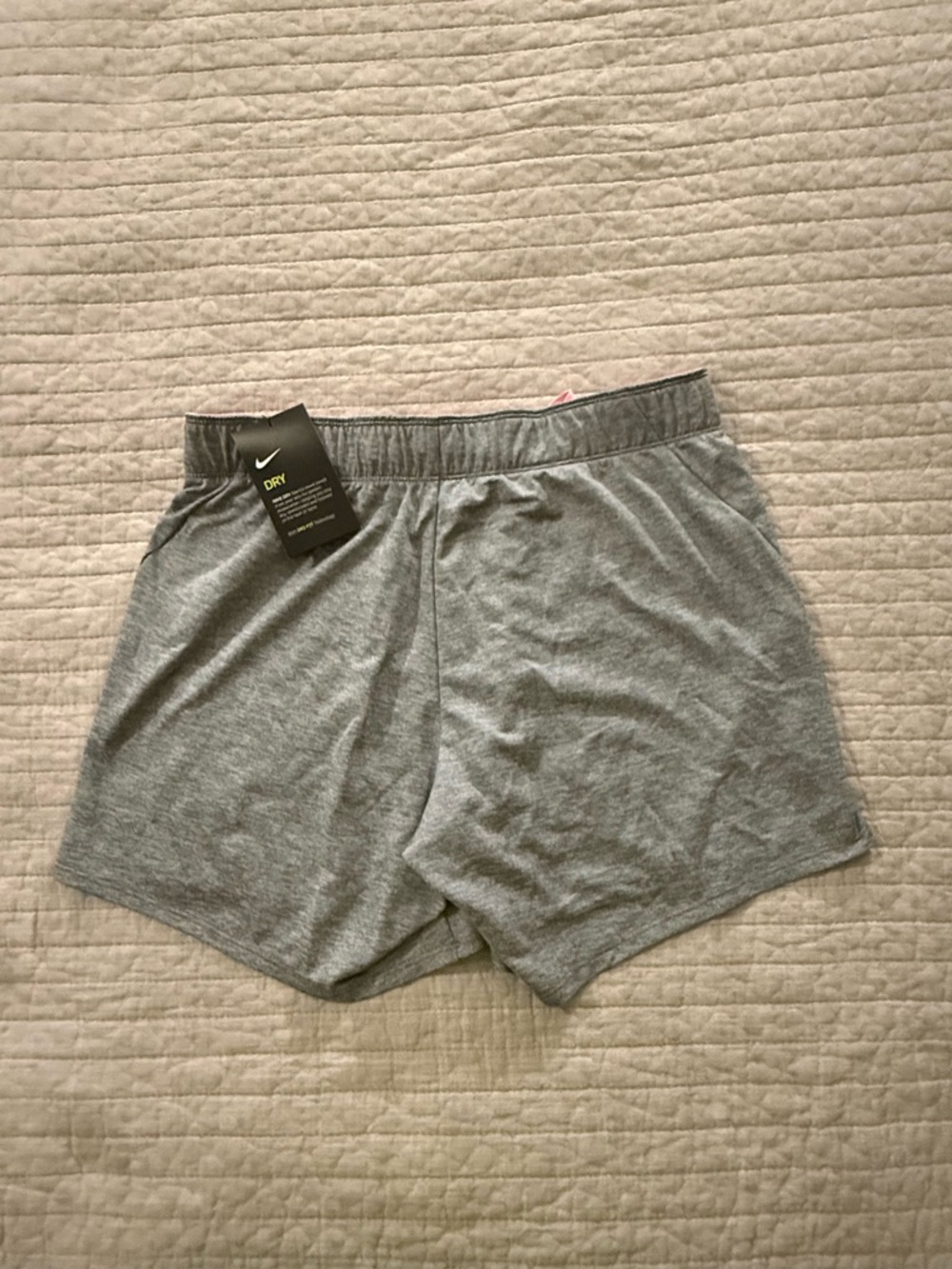 Nike Women’s Gray Athletic Shorts with Pink Swoosh - Picture 5 of 6